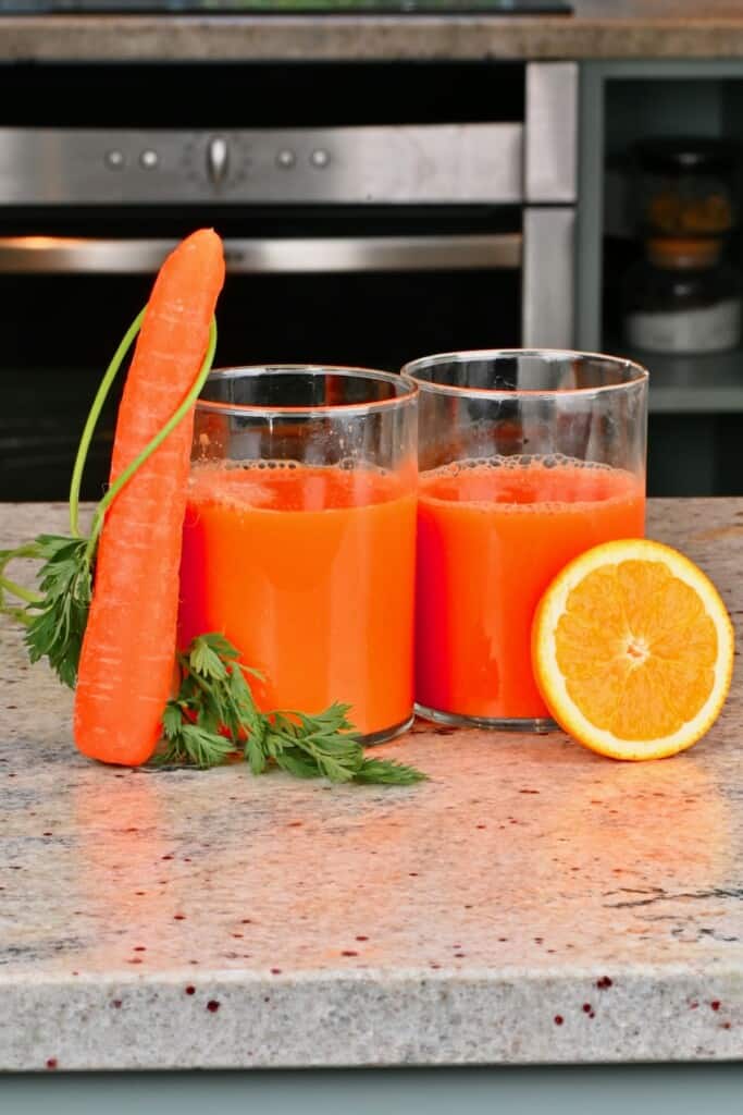 Two glasses of orange carrot juice