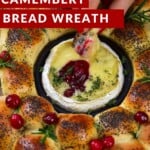 Baked camembert in the center of dinner rolls topped with cranberries
