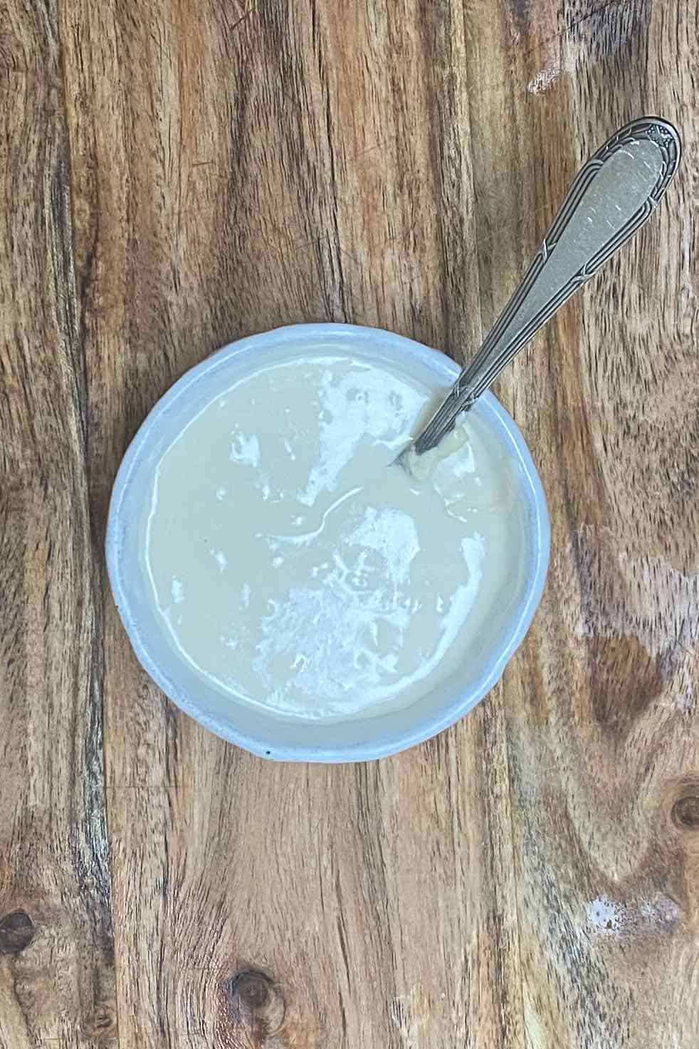 Tahini sauce in a small bowl