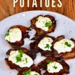 Smashed potatoes topped with white sauce in a plate