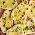 A few naan breads on a flat surface
