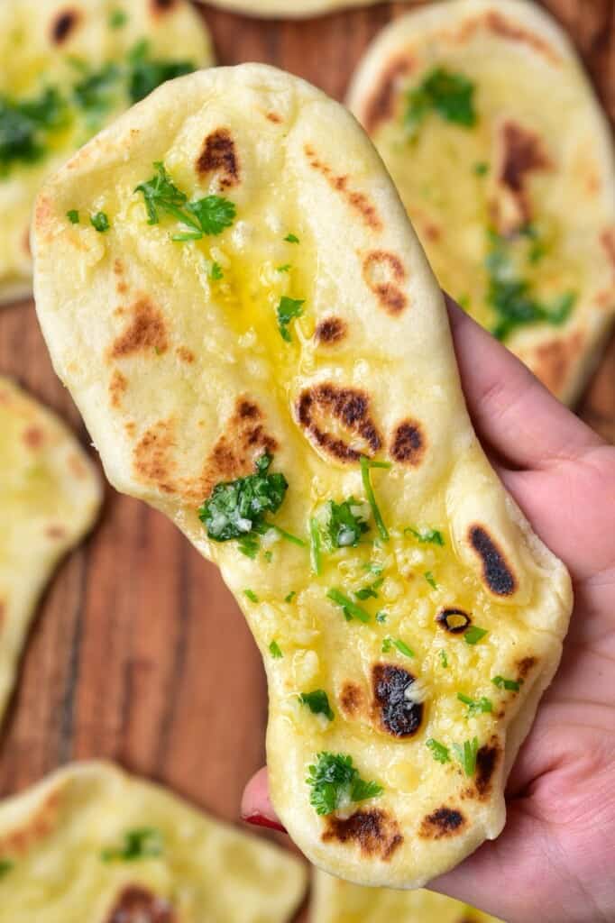 Naan bread in a hand