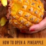 Pulling apart a piece of a pineapple