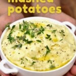 Mashed potatoes topped with black pepper and herbs