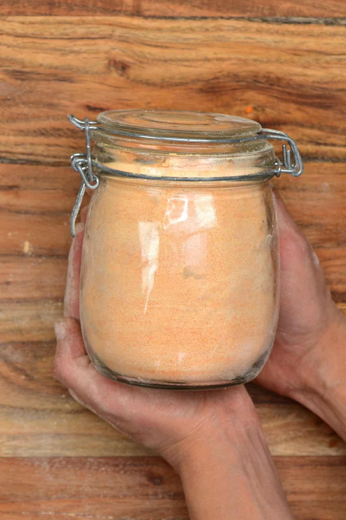 Red lentil flour in a jar