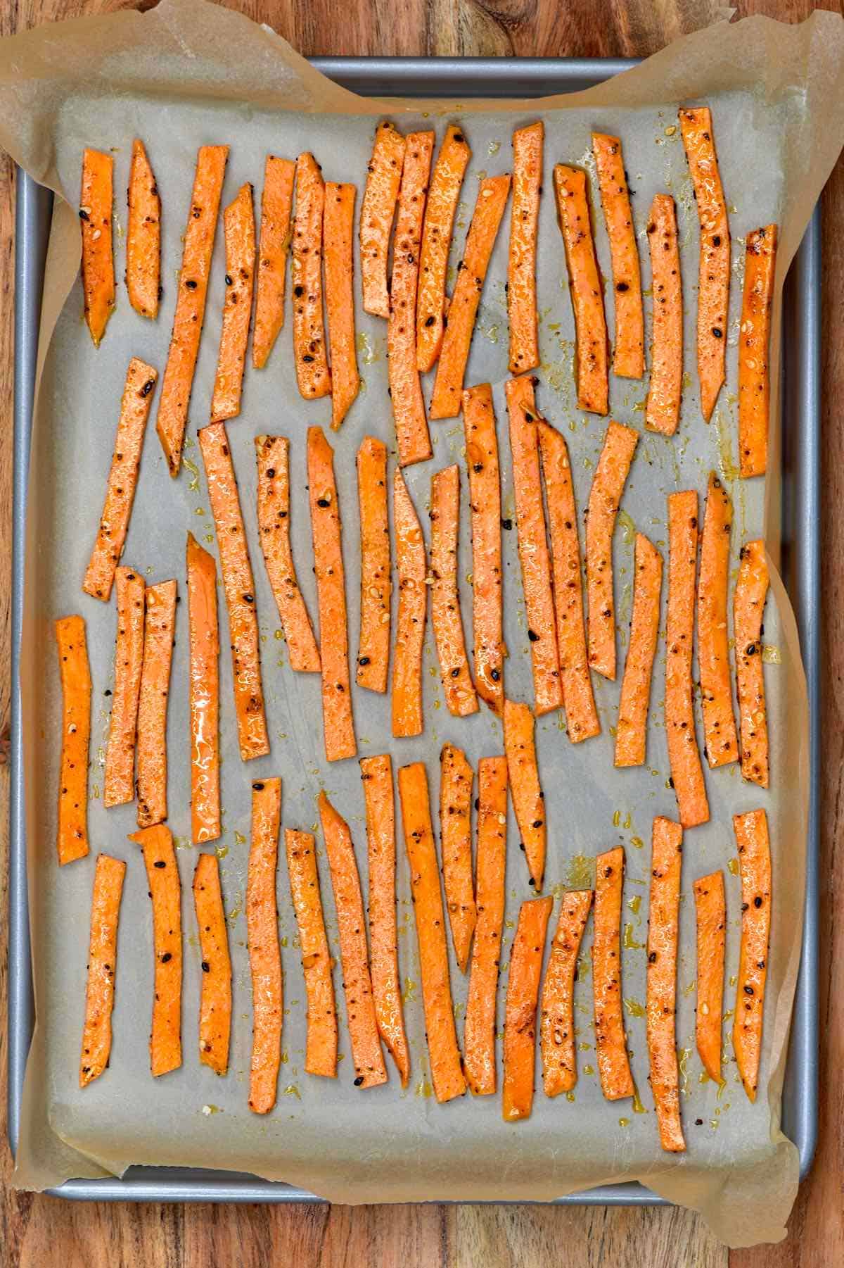 Sweet potato fried arranged in a baking tray