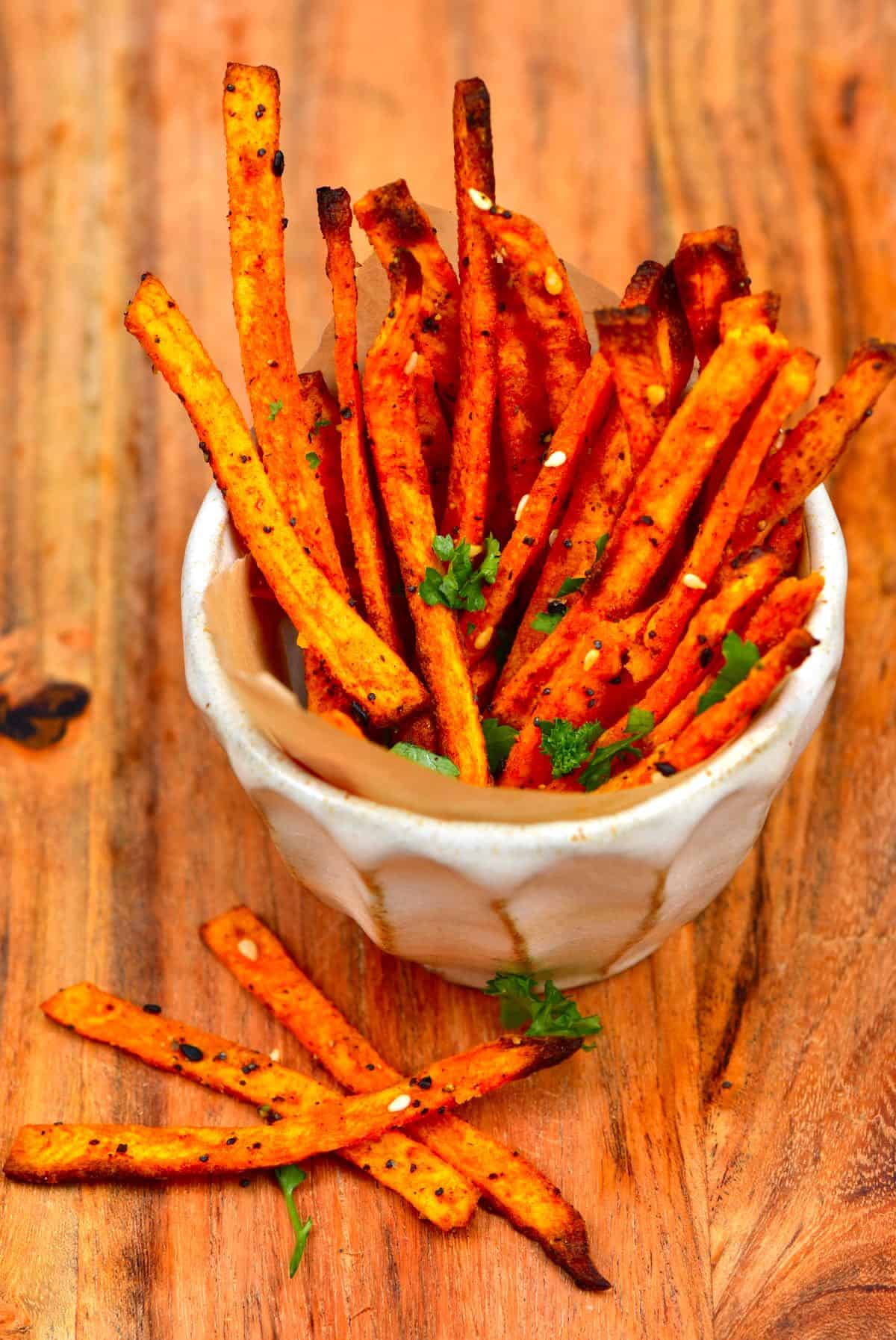 Sweet potato fries served in a small bowl