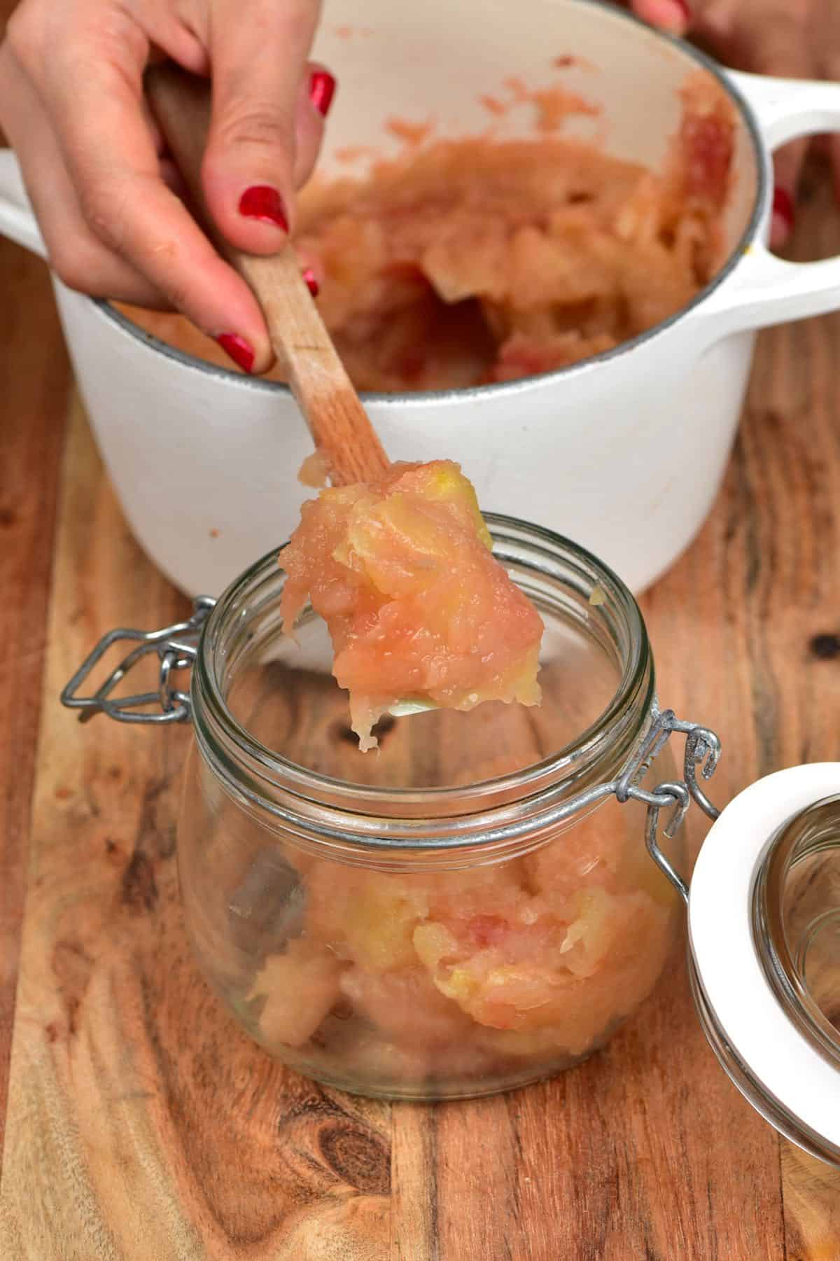 Filling a jar with Applesauce