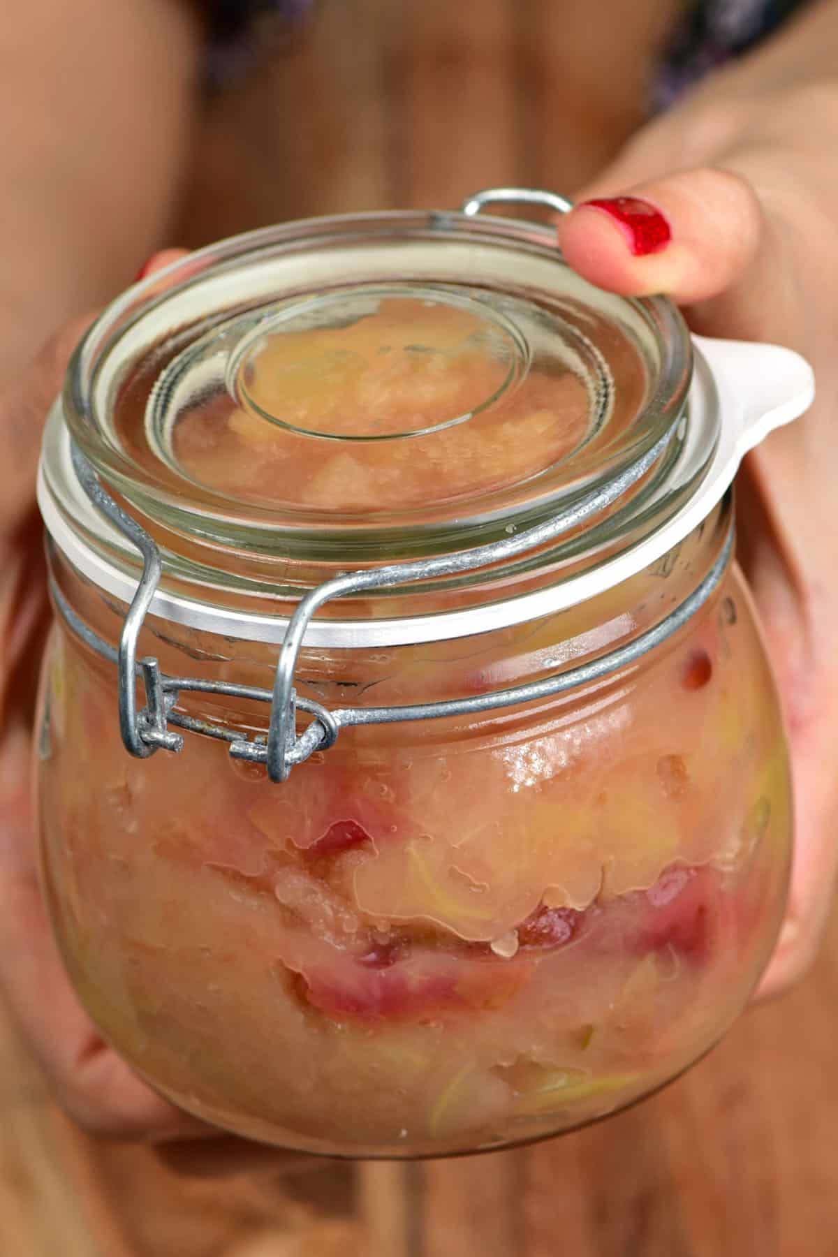 A closed jar with homemade Applesauce