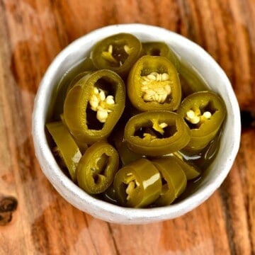 Pickled jalapeños in a small bowl