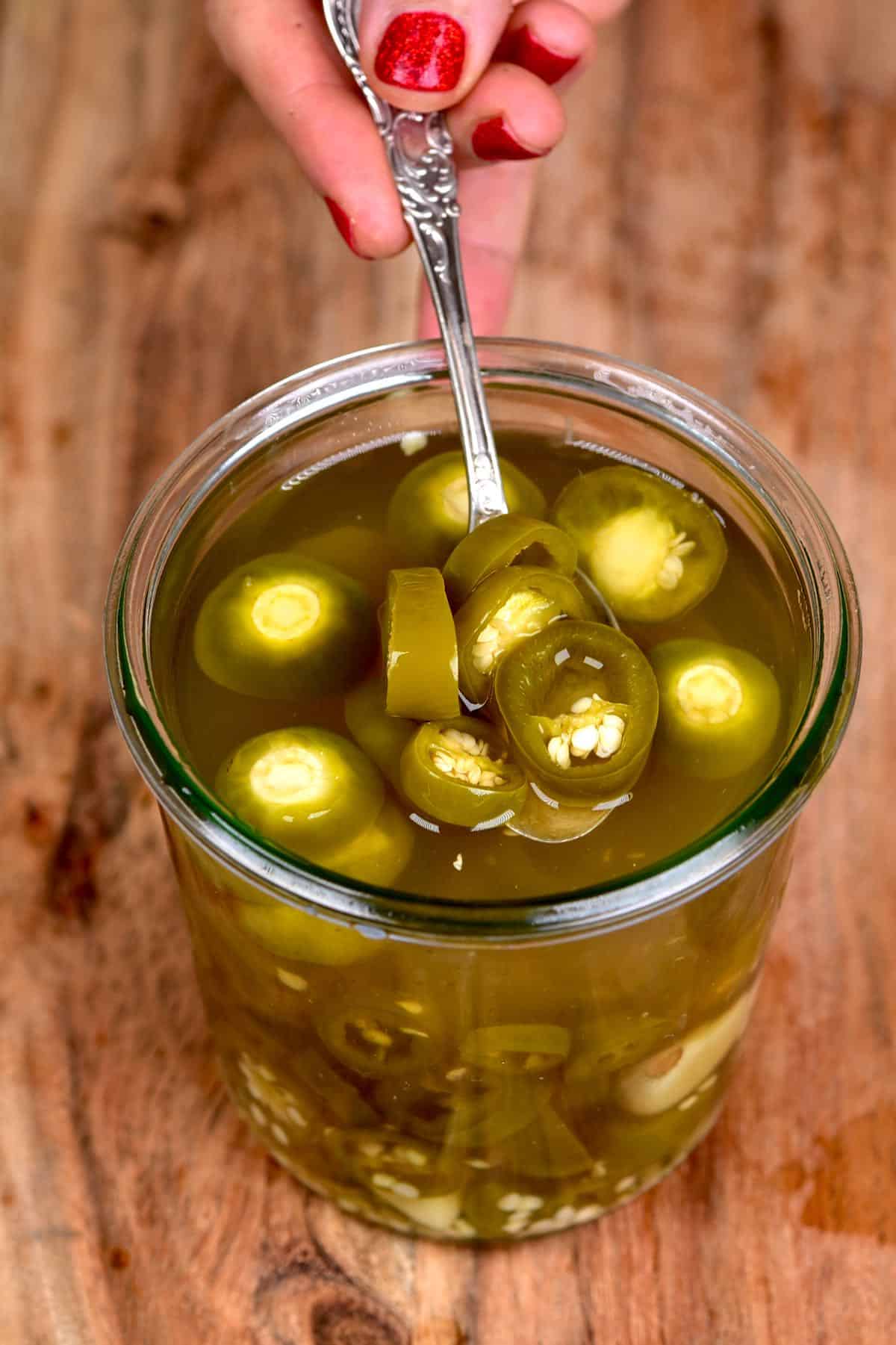 Pickled jalapeños in a jar