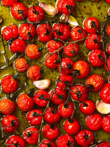 Tomato confit with garlic still in a baking tray