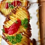 Accordion potato on a stick topped with ketchup and parsley