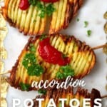 Three accordion potatoes on stick topped with ketchup and parsley