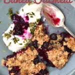 Two slices of Blueberry Baked Oatmeal with yogurt served in a plate