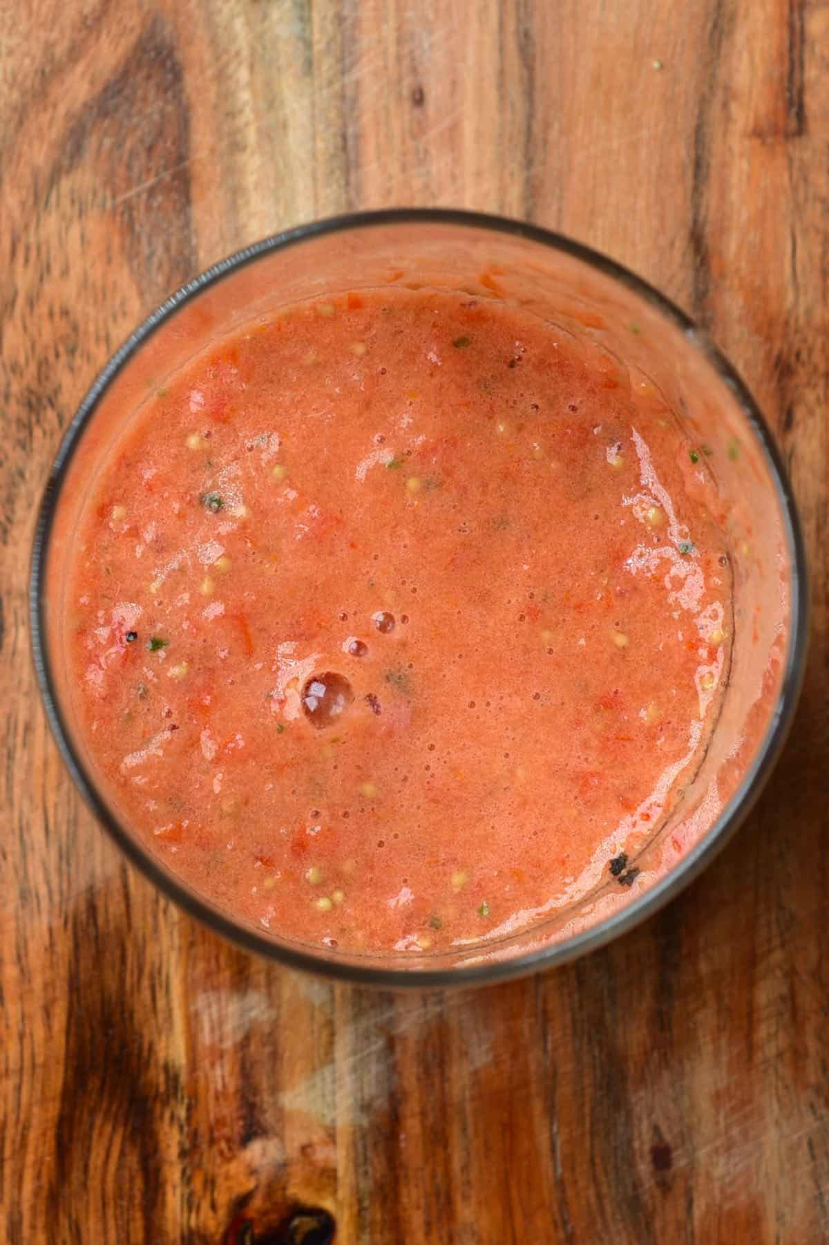 Top view of a glass full with gazpacho