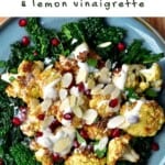 Kale salad topped with roasted cauliflower