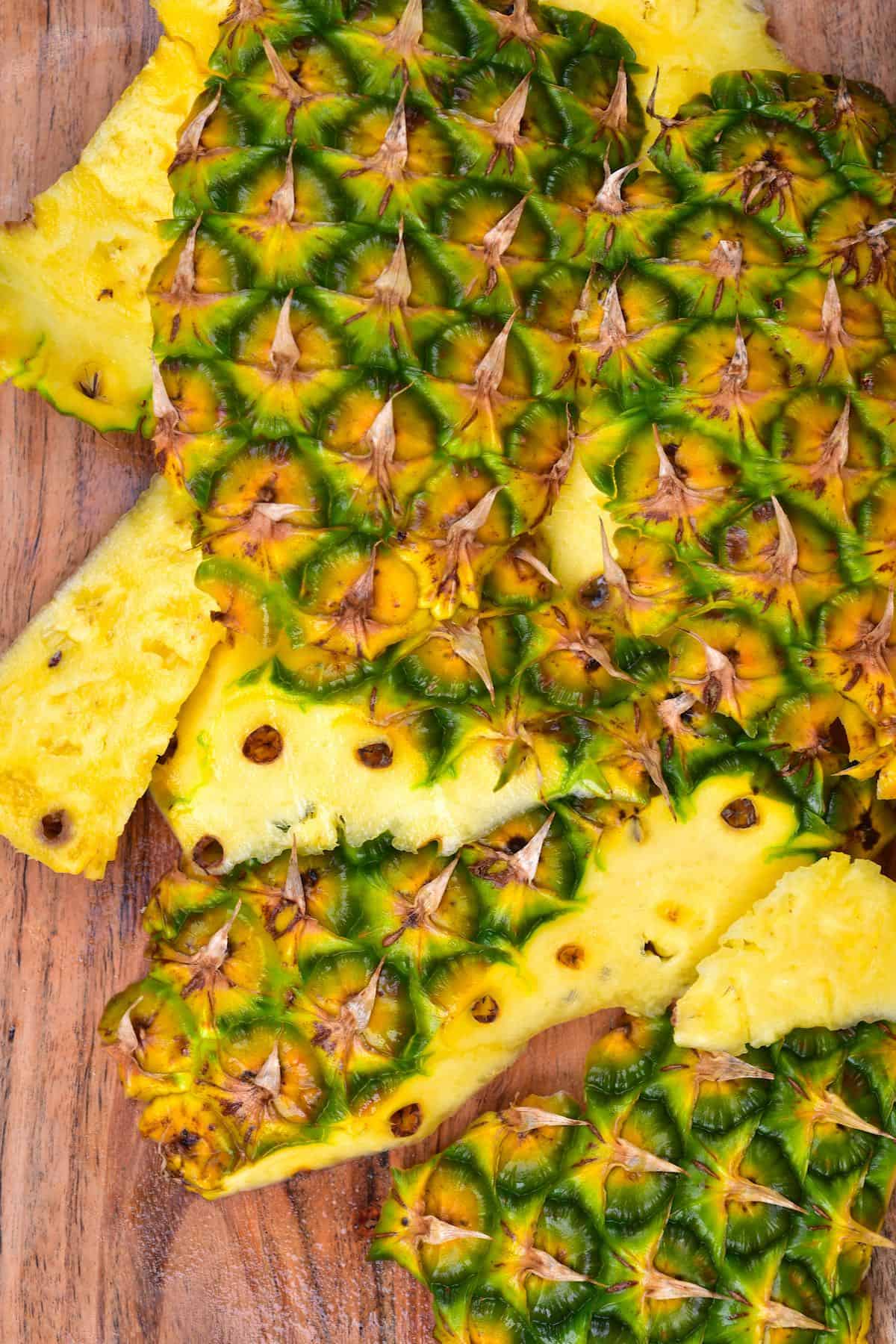 Pineapple peel on a wooden surface