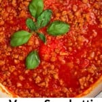 Vegan bolognese sauce topped with basil leaves