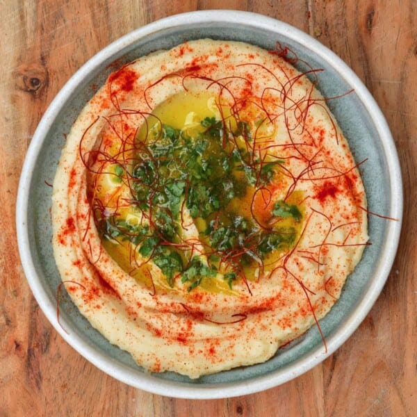 White bean roasted garlic dip served in a plate