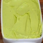 Avocado butter in a butter dish