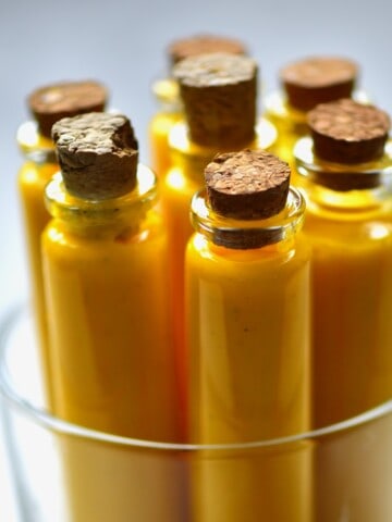 Small bottles with turmeric juice