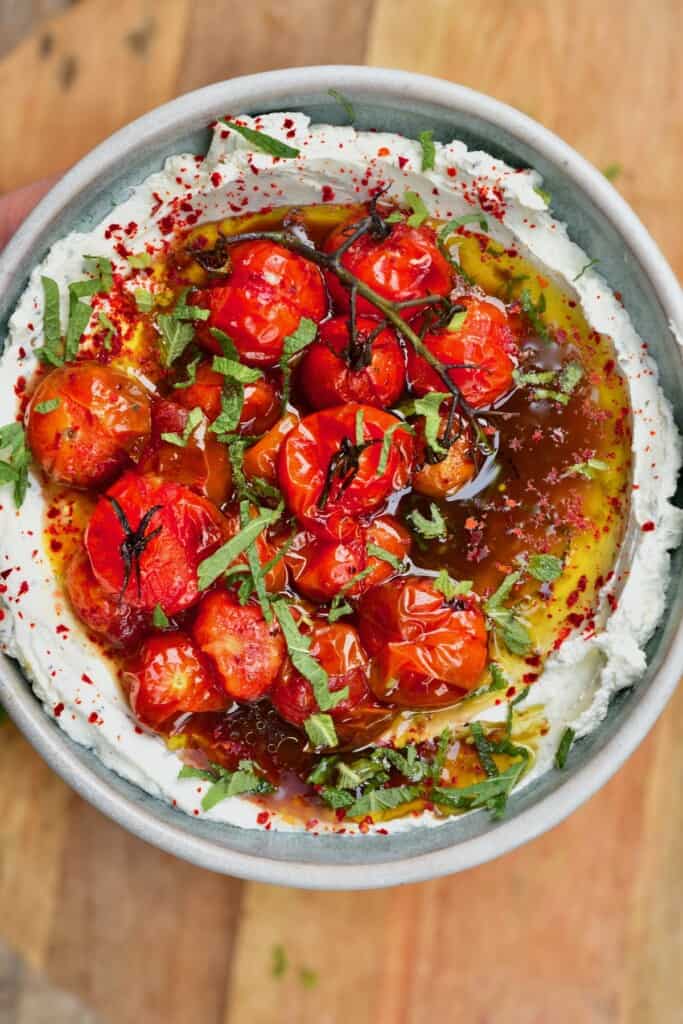 Labneh Dip with roasted tomatoes topped with fresh mint