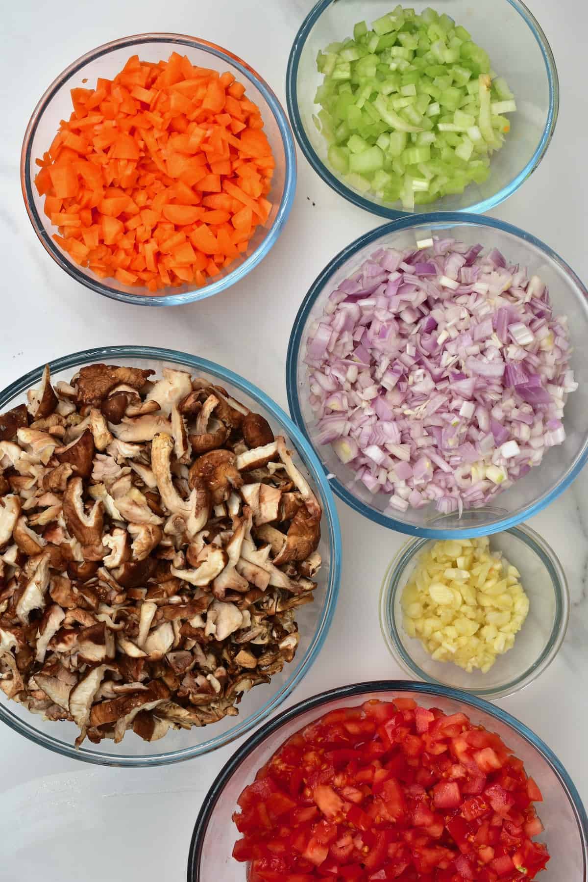 Chopped veggies in different bowls