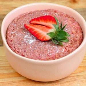 A strawberry on top of strawberry baked oats