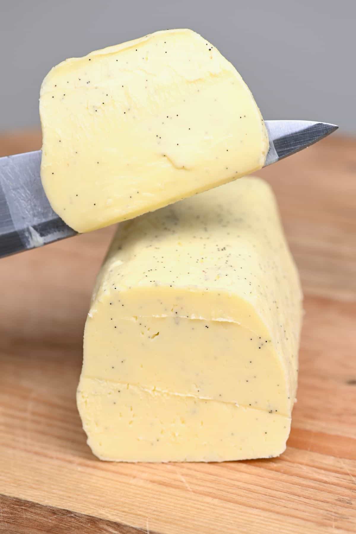 Cutting a slice of vanilla butter
