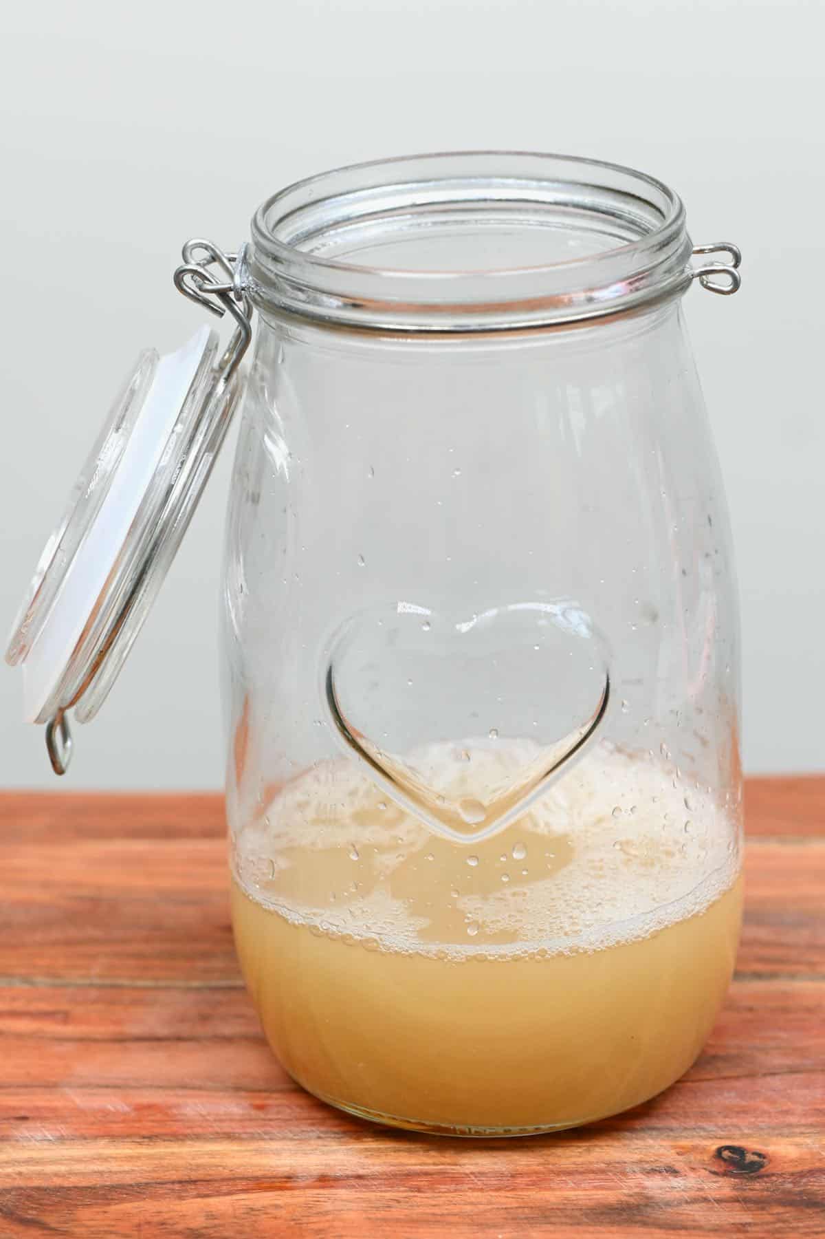 Chickpea liquid in a jar