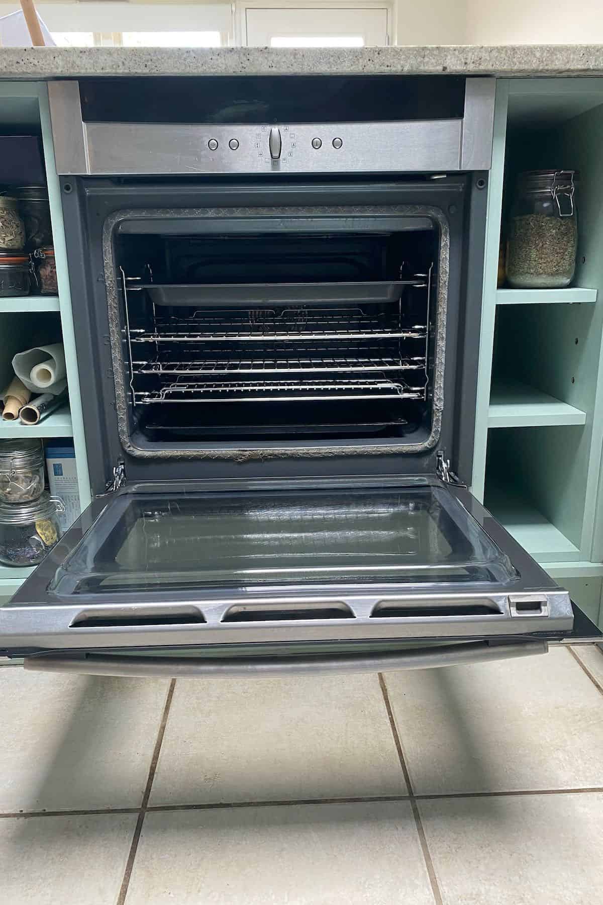 A clean oven with open door