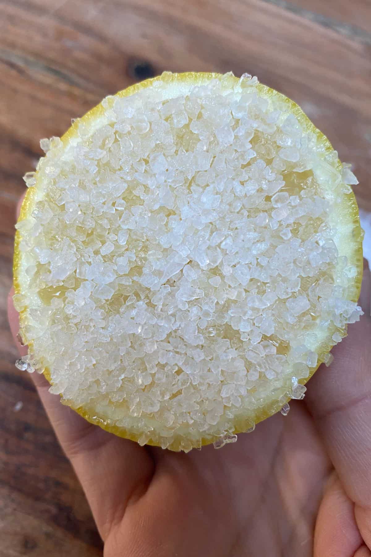 Half a lemon with coarse salt