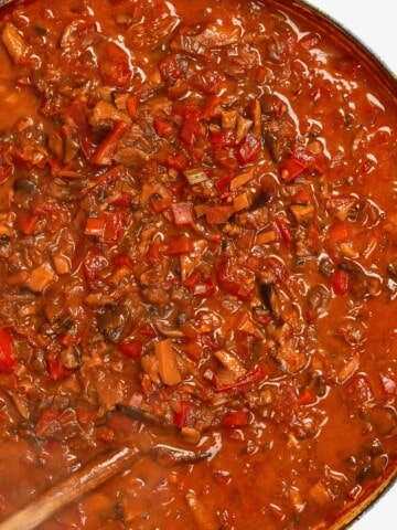 A large pan with mushroom bolognese