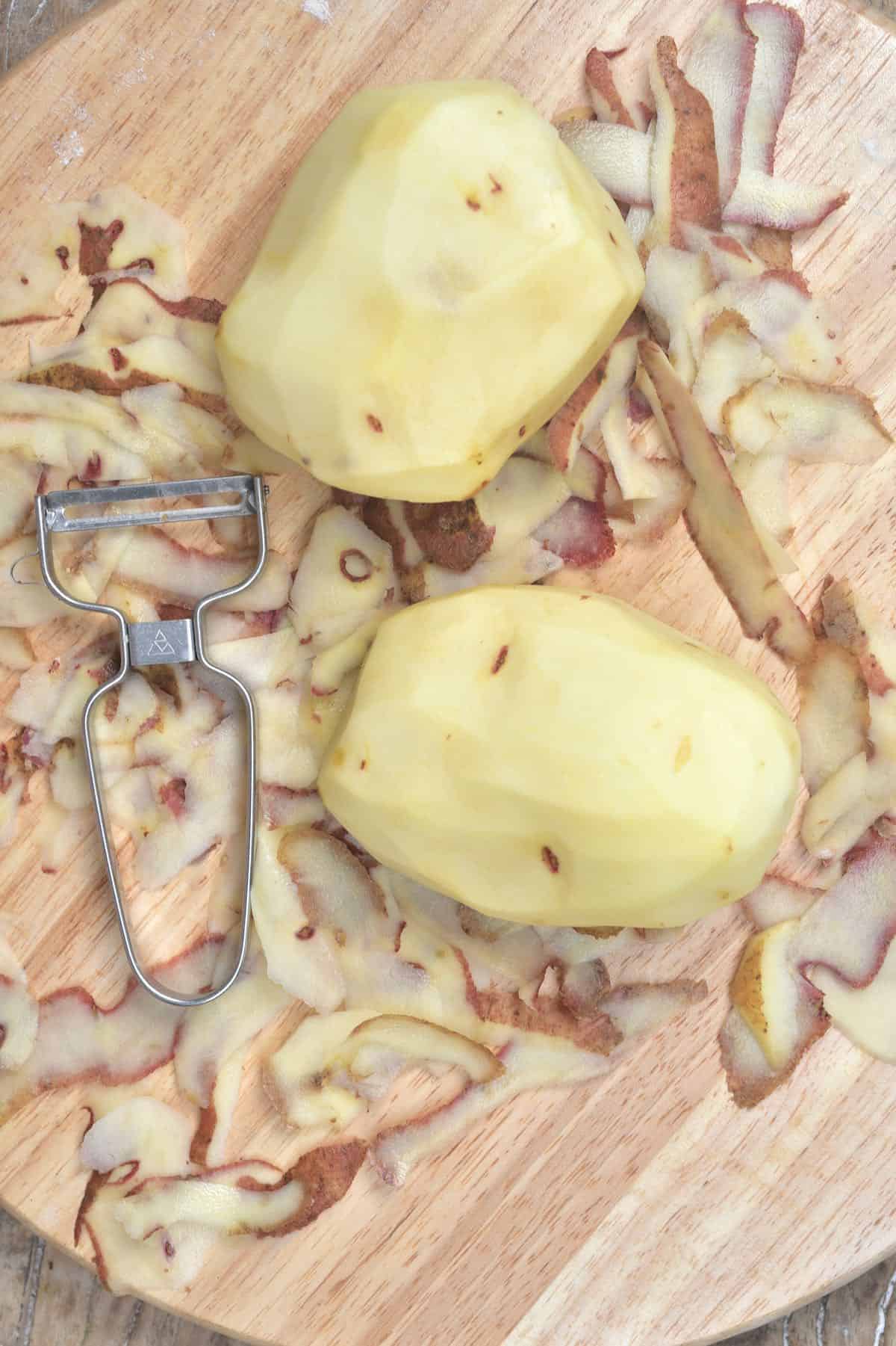 Two peeled potatoes