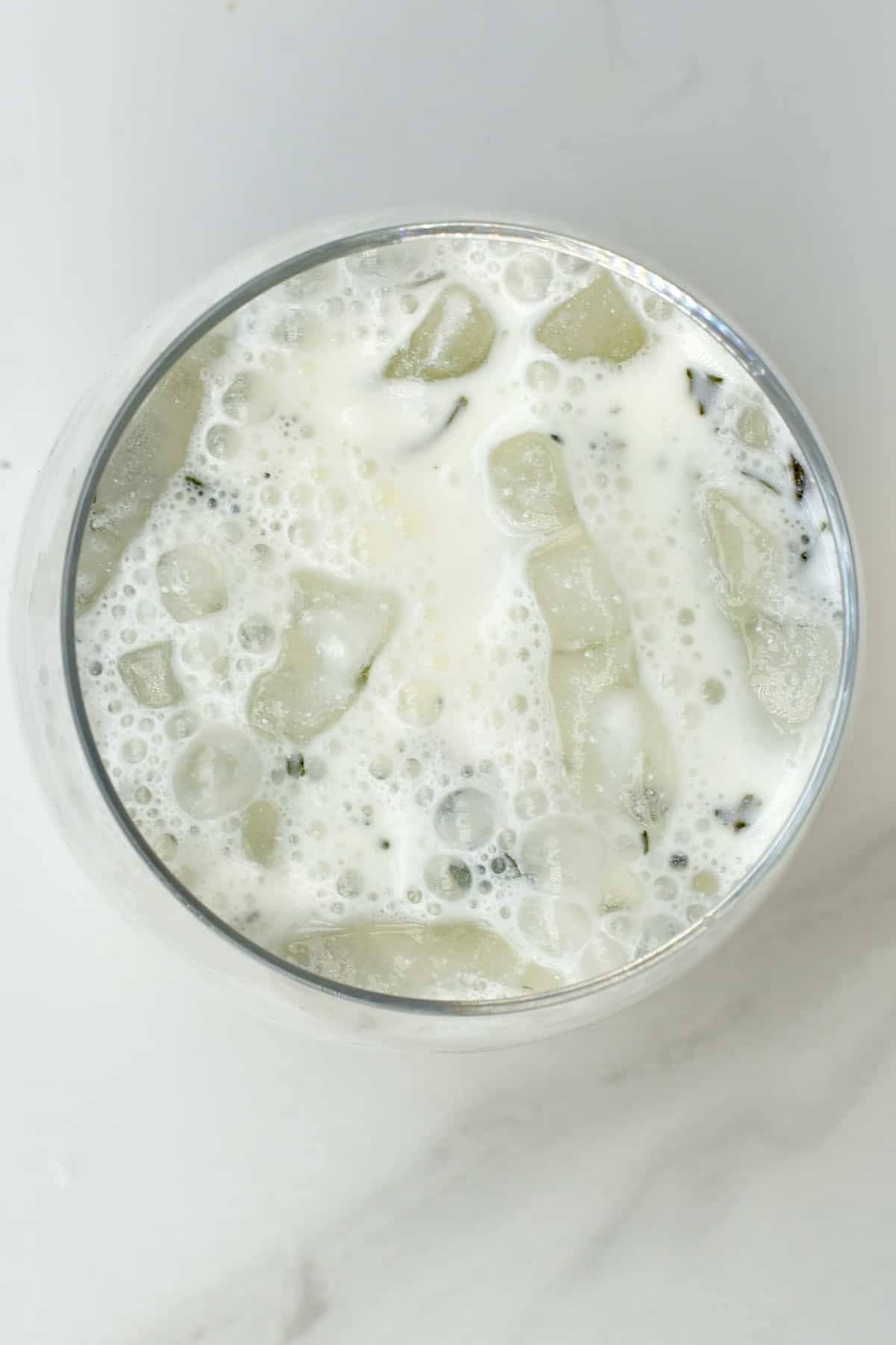Ayran with ice cubes in a glass - also called doogh