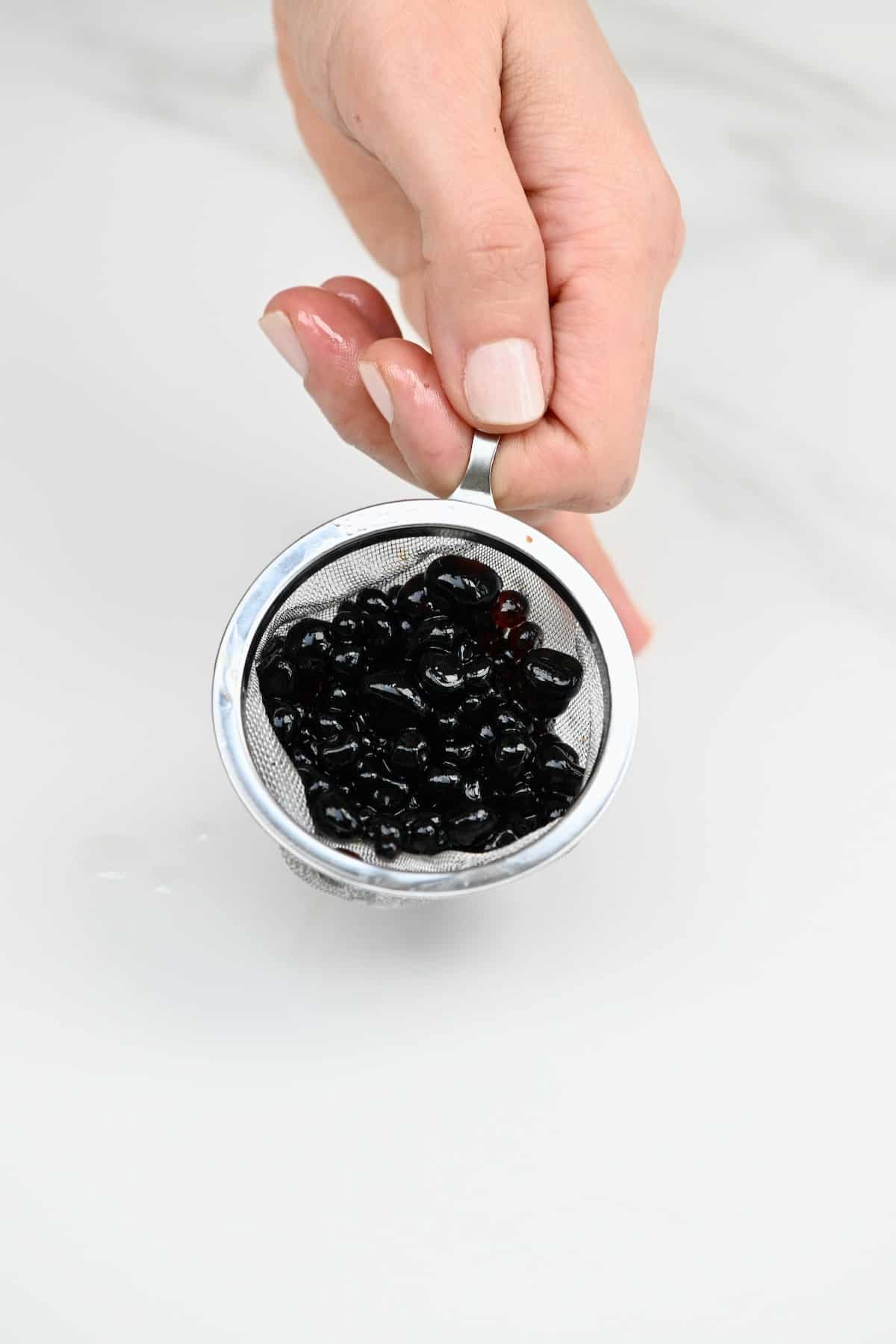 Balsamic caviar in a little container