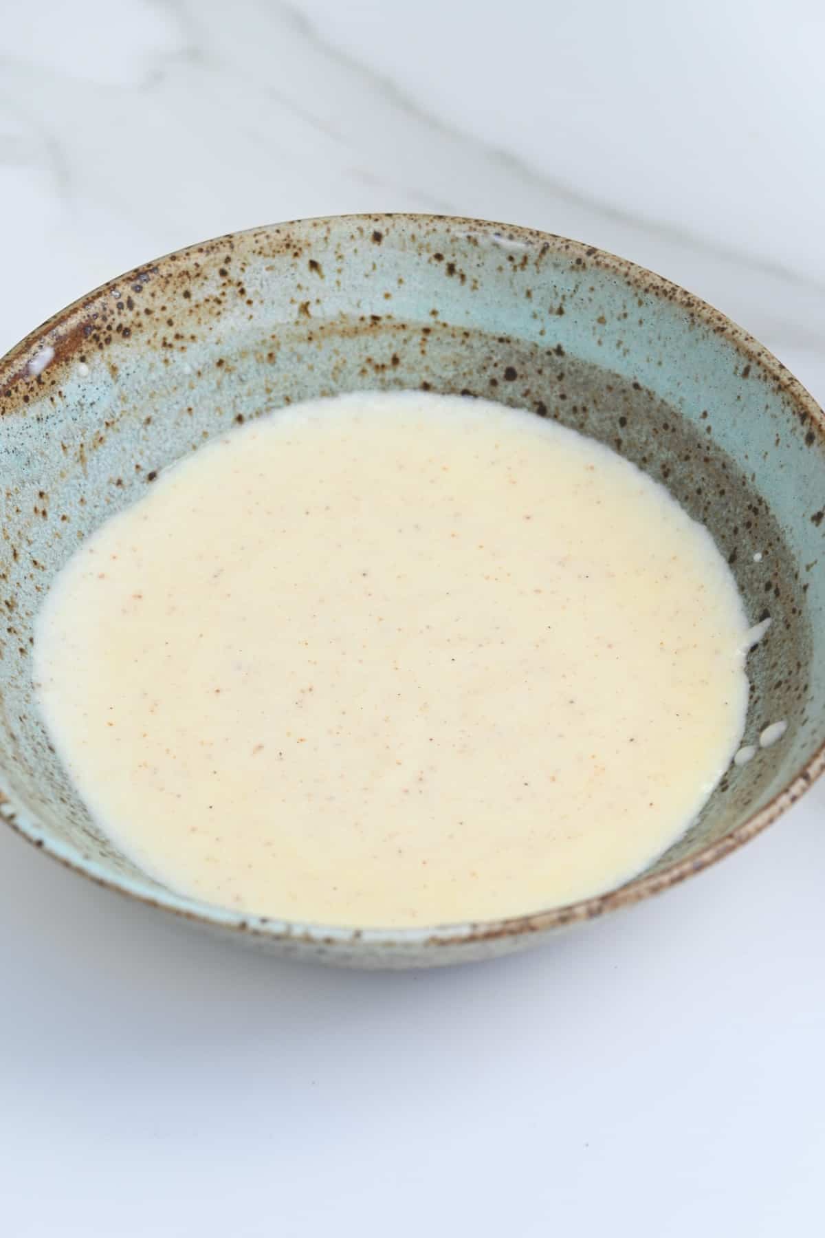 Bechamel sauce in a bowl