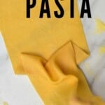 A thin sheet of homemade egg pasta