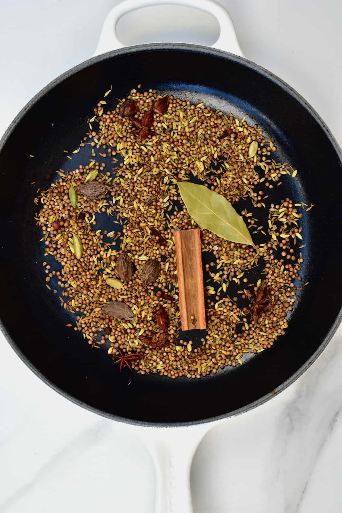 Toasting spices in a pan