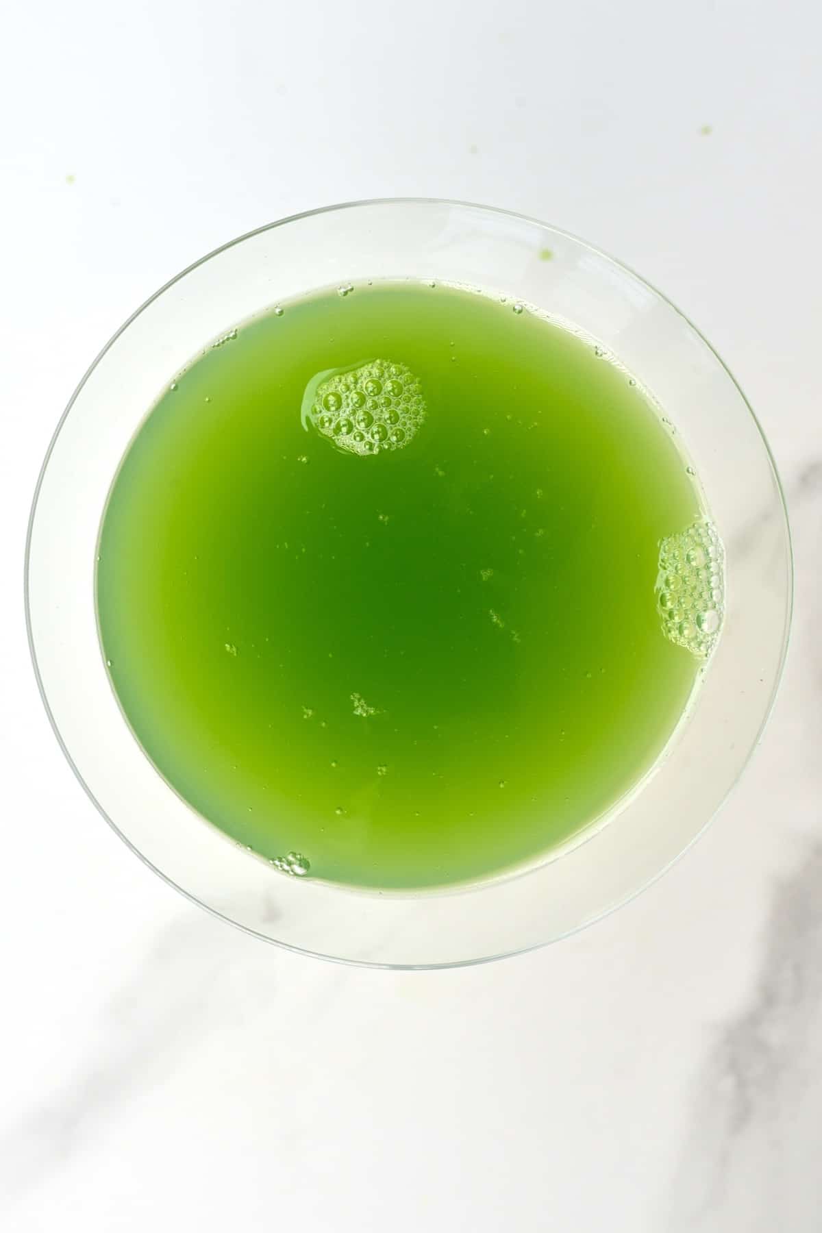 Top viewo of a glass with cucumber juice