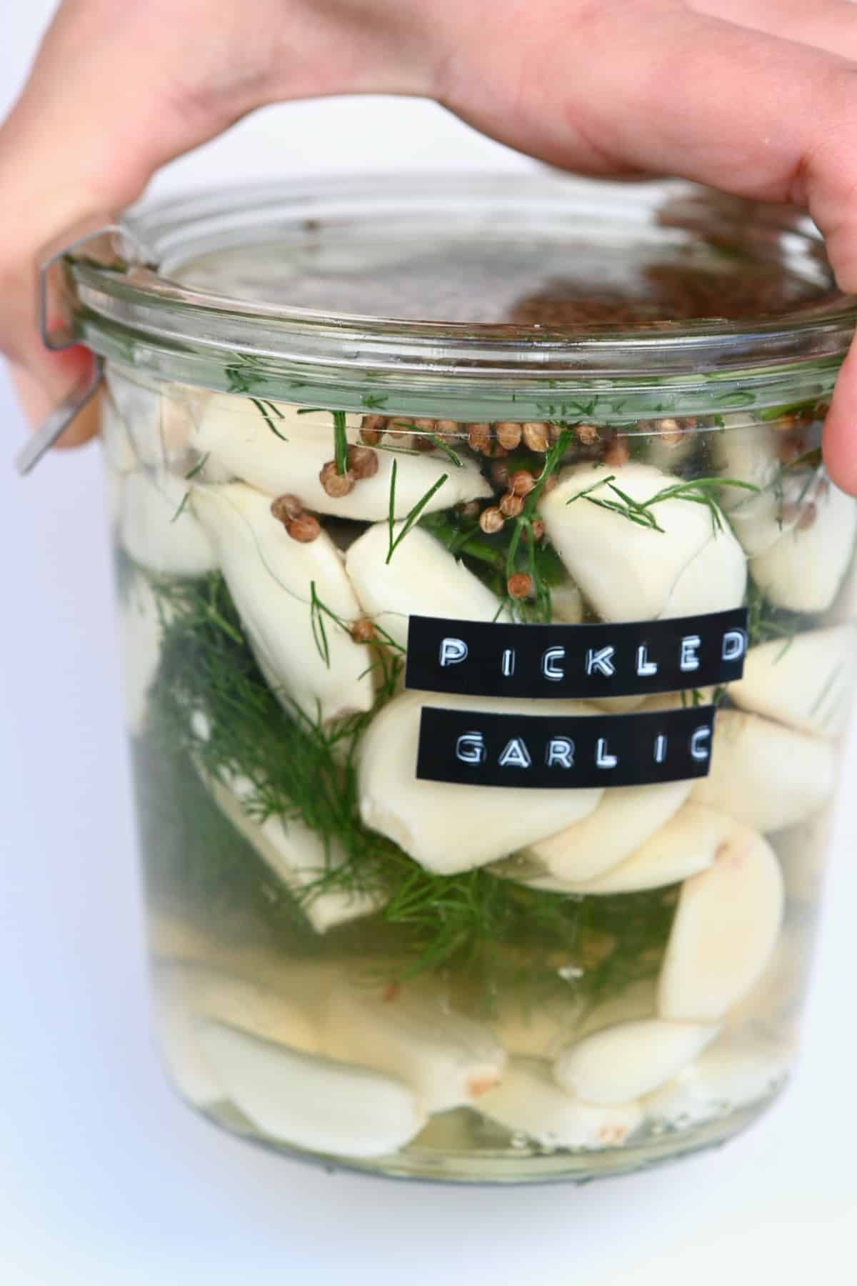 A jar with pickled garlic