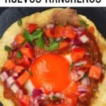 Huevos rancheros topped with pico de gallo