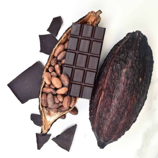Chocolate bar, cacao beans and cacao pod