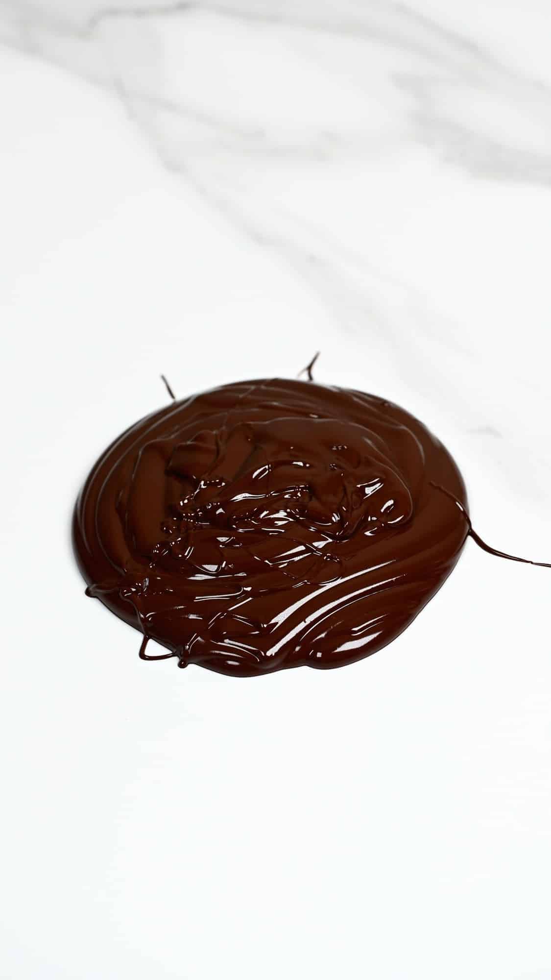 Melted chocolate on flat surface