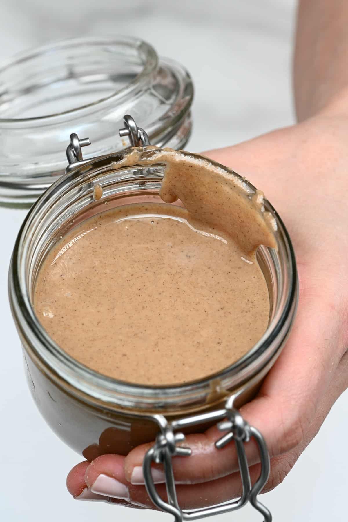 A jar with granola butter