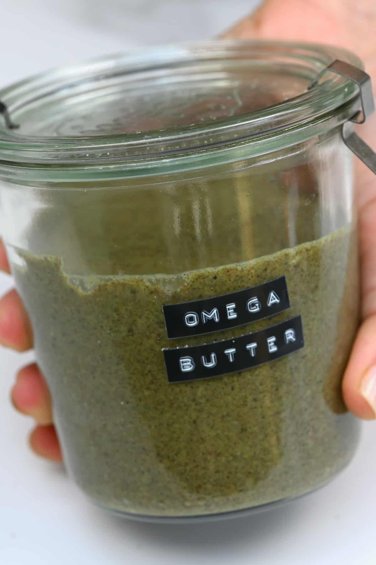 A jar with omega seed butter