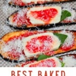 Baked eggplant slices topped with cheese and tomato passata