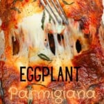 A fork digging into an eggplant parmigiana