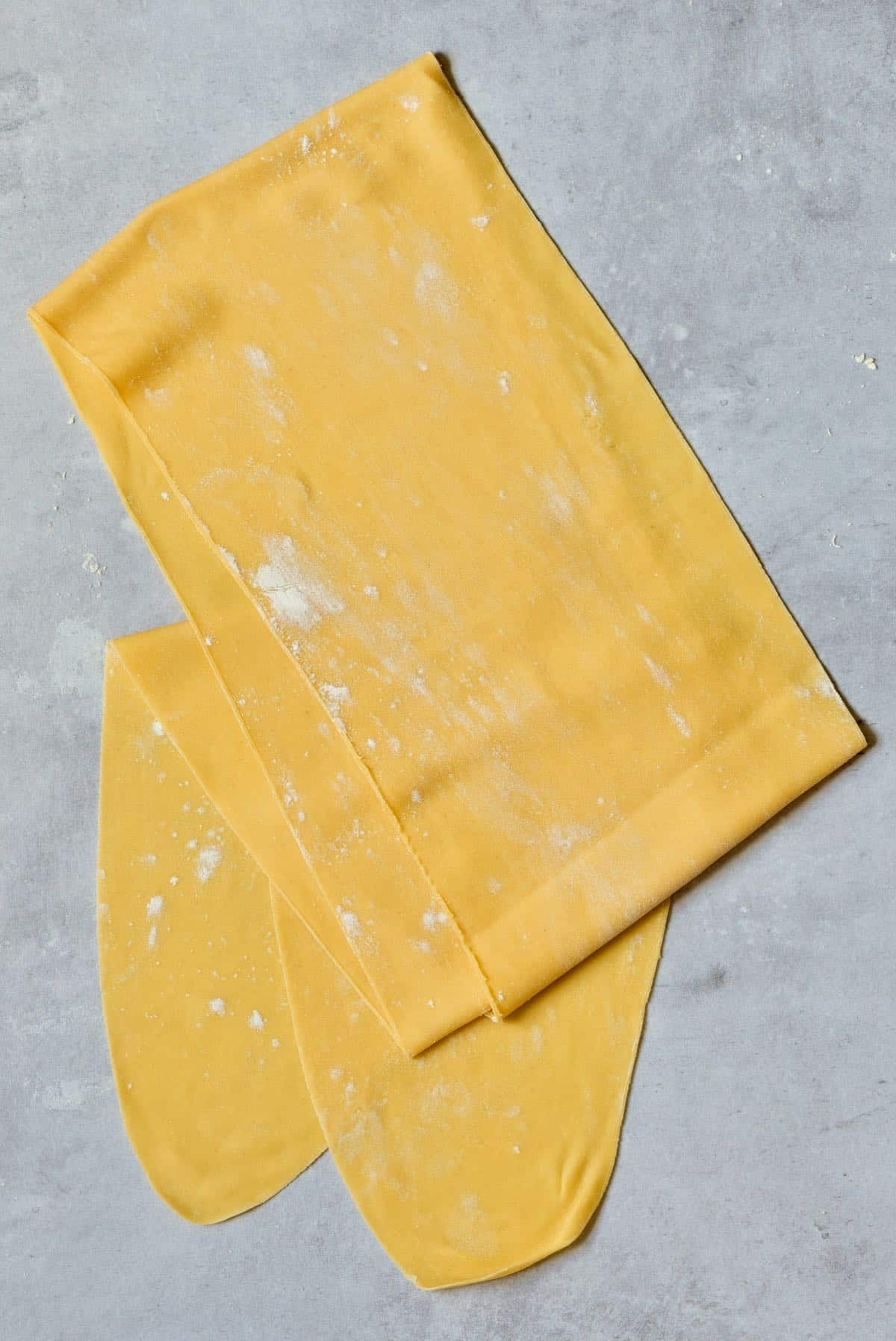 Pasta sheet on a grey surface